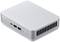 Un mini-PC compact de couleur argentée avec plusieurs ports USB à l'avant et des fentes de ventilation sur les côtés.