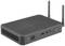 Un mini-PC noir à surface nervurée et deux antennes Wi-Fi, montrant deux ports USB et un bouton d'alimentation sur l'avant.