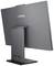 Un moniteur Lenovo vu de dos, montrant son socle stable et les diverses options de connexion à l'arrière.