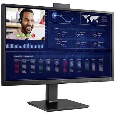 Un écran d'ordinateur affiche une visioconférence avec une personne, à côté de diagrammes et de tableaux présentant des chiffres de ventes globaux et des tendances.