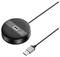 Hub USB noir et rond avec trois ports USB bleus, relié par un câble.