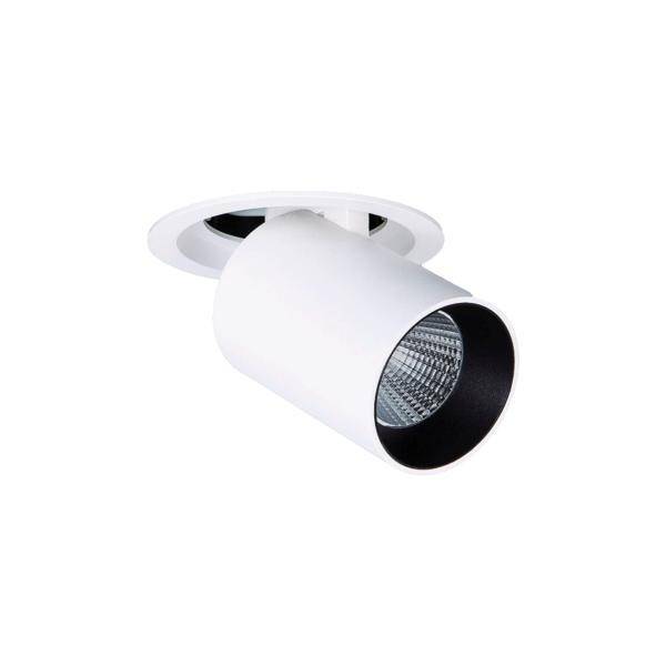 Lampe blanche cylindrique avec intérieur noir ; montée au plafond, adaptée à l'éclairage d'accentuation.