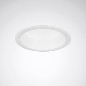 Un luminaire blanc est encastré dans le matériau du plafond et diffuse une lumière douce. Il a une forme circulaire.