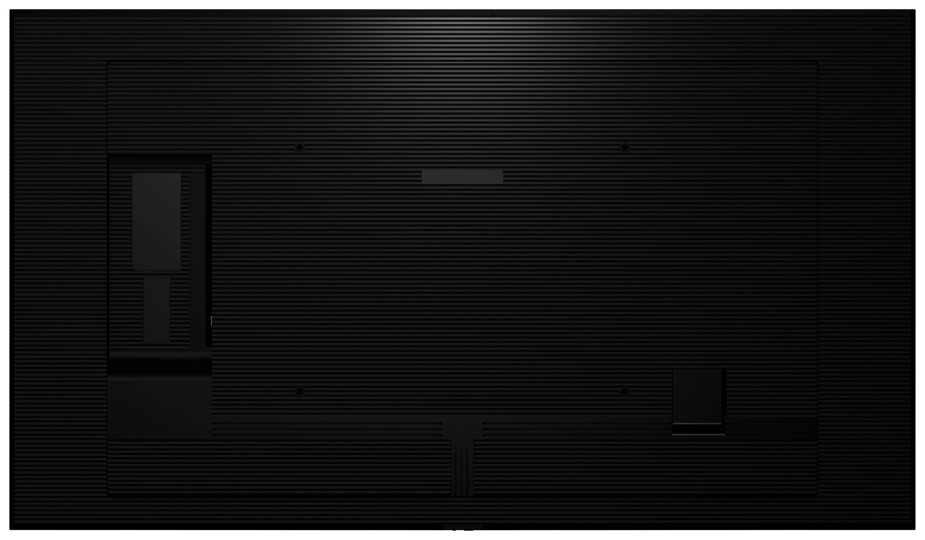 Un grand objet rectangulaire noir avec un motif nervuré et plusieurs ouvertures à l'arrière.