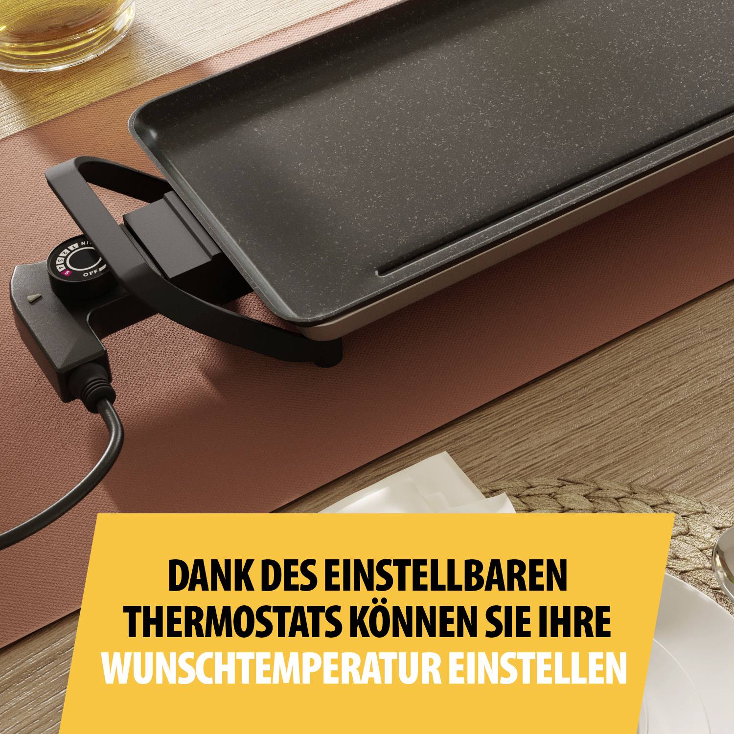 Une plaque de grill électrique posée sur une table, avec un réglage de température. Le texte en dessous met en évidence la température souhaitée réglable.