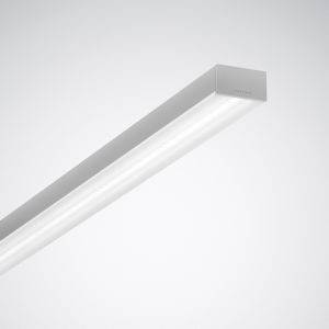 Plafonnier LED rectangulaire allongé au design épuré et moderne, installé dans un espace aménagé de manière minimaliste.