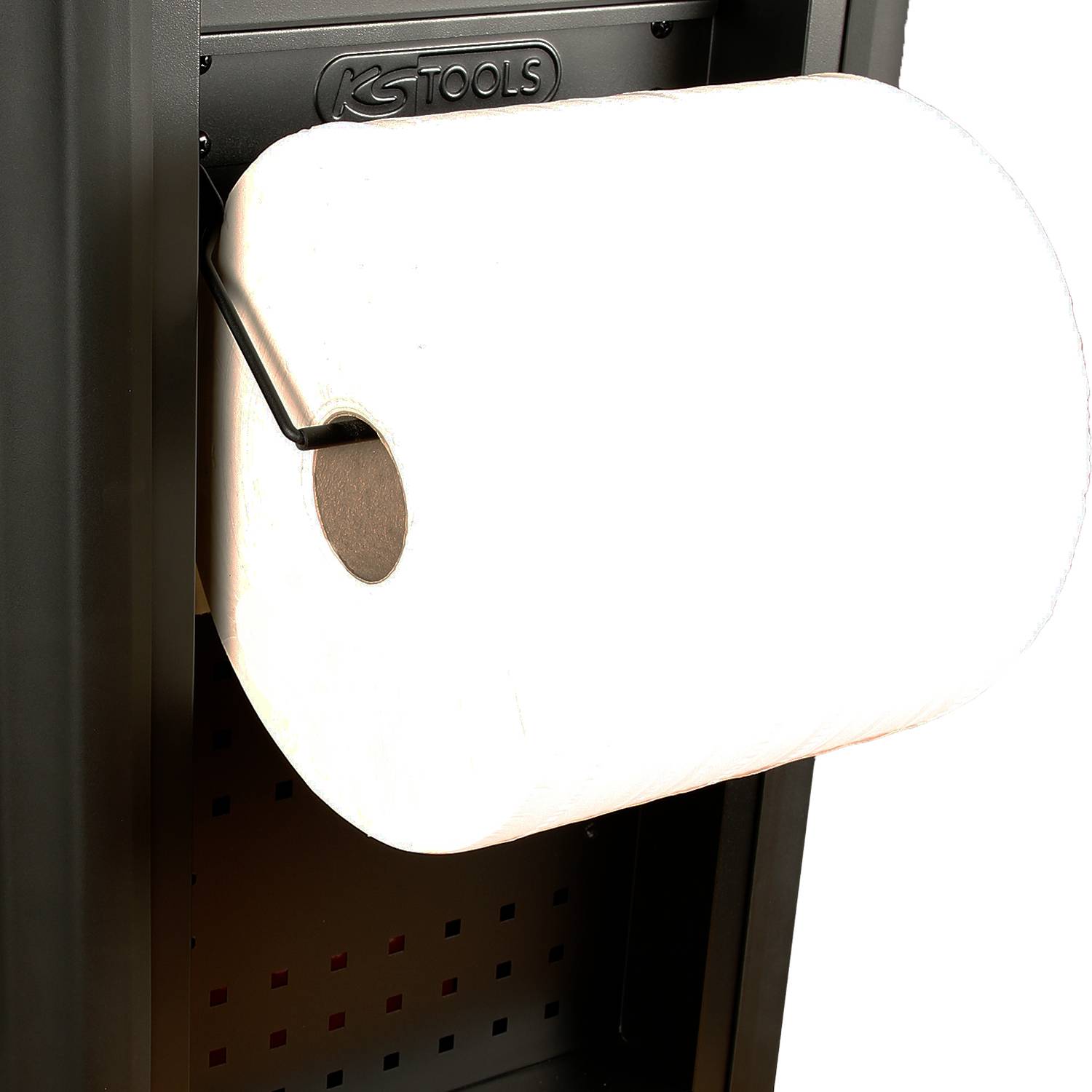 Un grand rouleau d'essuie-mains en papier est fixé sur un support noir. Le support porte le logo 'Tools' en haut.