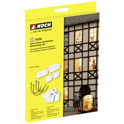 Kit de construction pour un ensemble d'éclairage LED pour bâtiment. Contient des LED, des câbles et des instructions. Présente une maquette de maison illuminée.