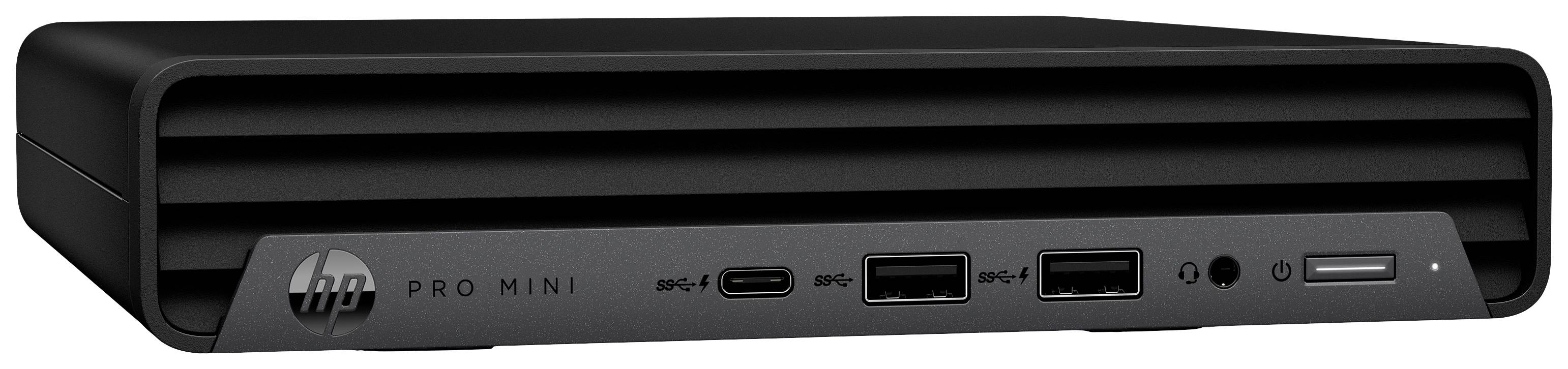Mini PC HP Pro noir avec plusieurs ports, dont USB-C et USB-A, sur la façade avant. Design compact, positionné à plat.