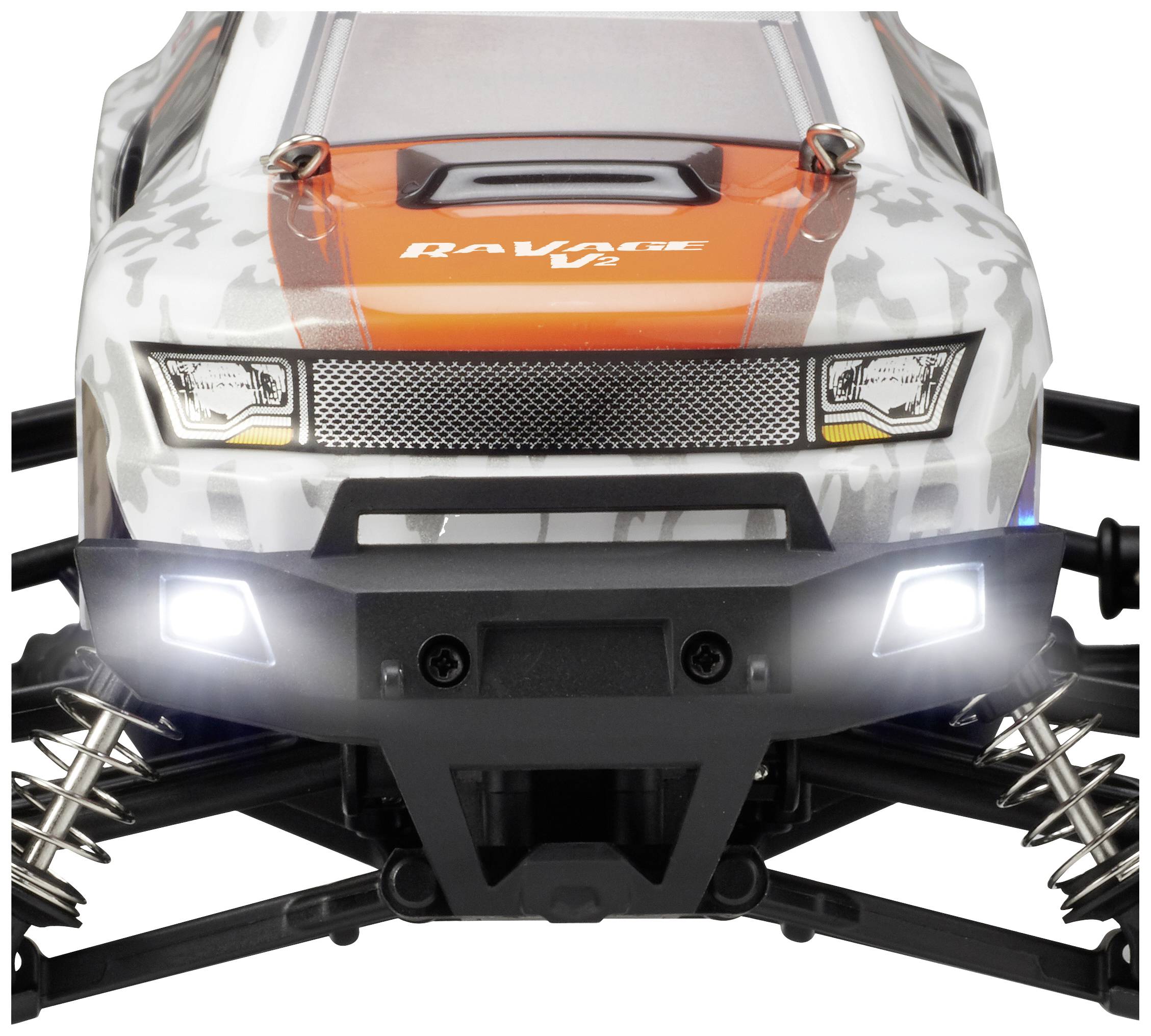 Une voiture télécommandée au design orange et blanc. On peut voir l'avant du véhicule avec ses phares et ses amortisseurs.
