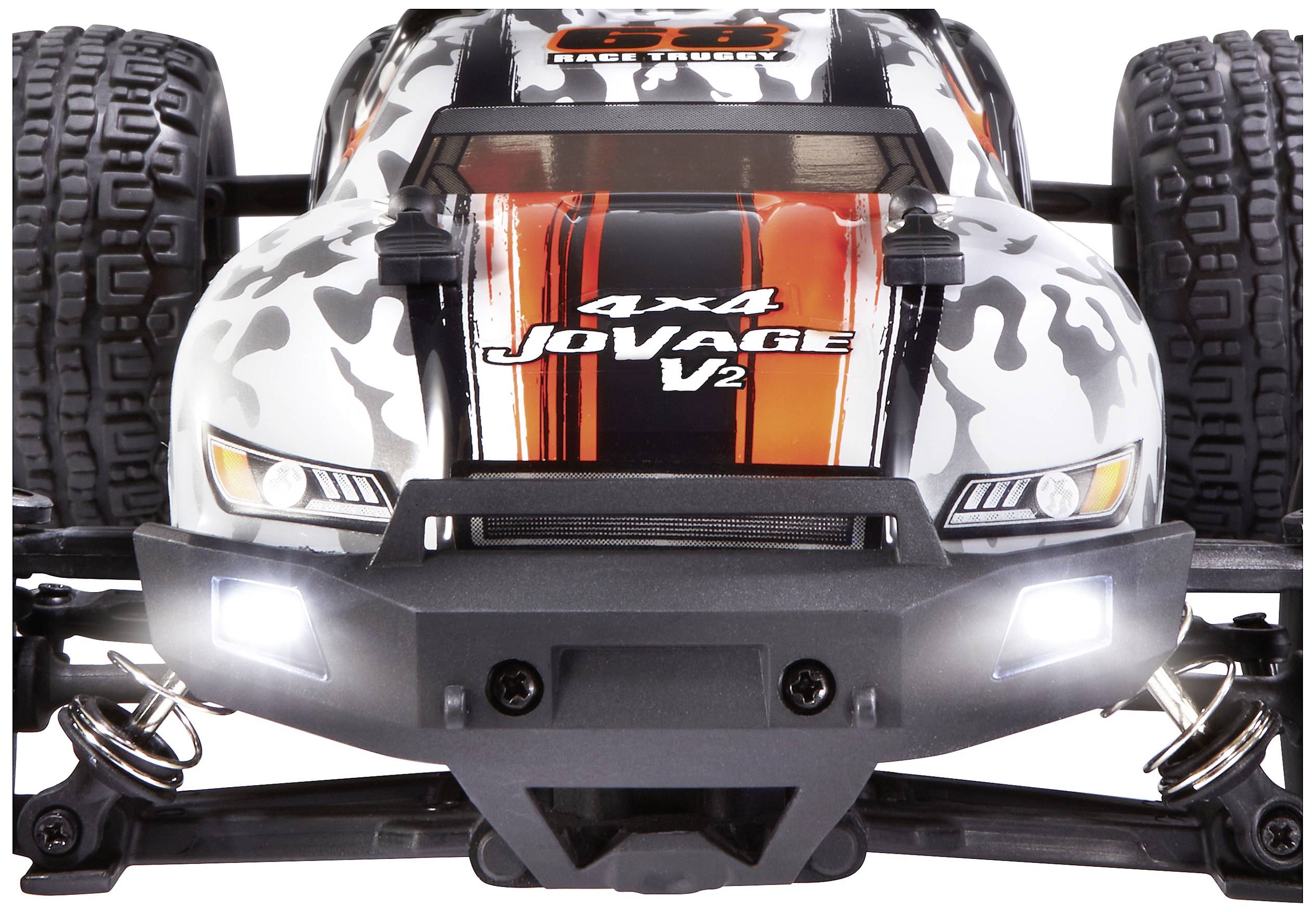 Voiture télécommandée en gros plan, modèle 4x4 JoVAGE V2, avec un design de carrosserie noir, blanc et orange distinctif.