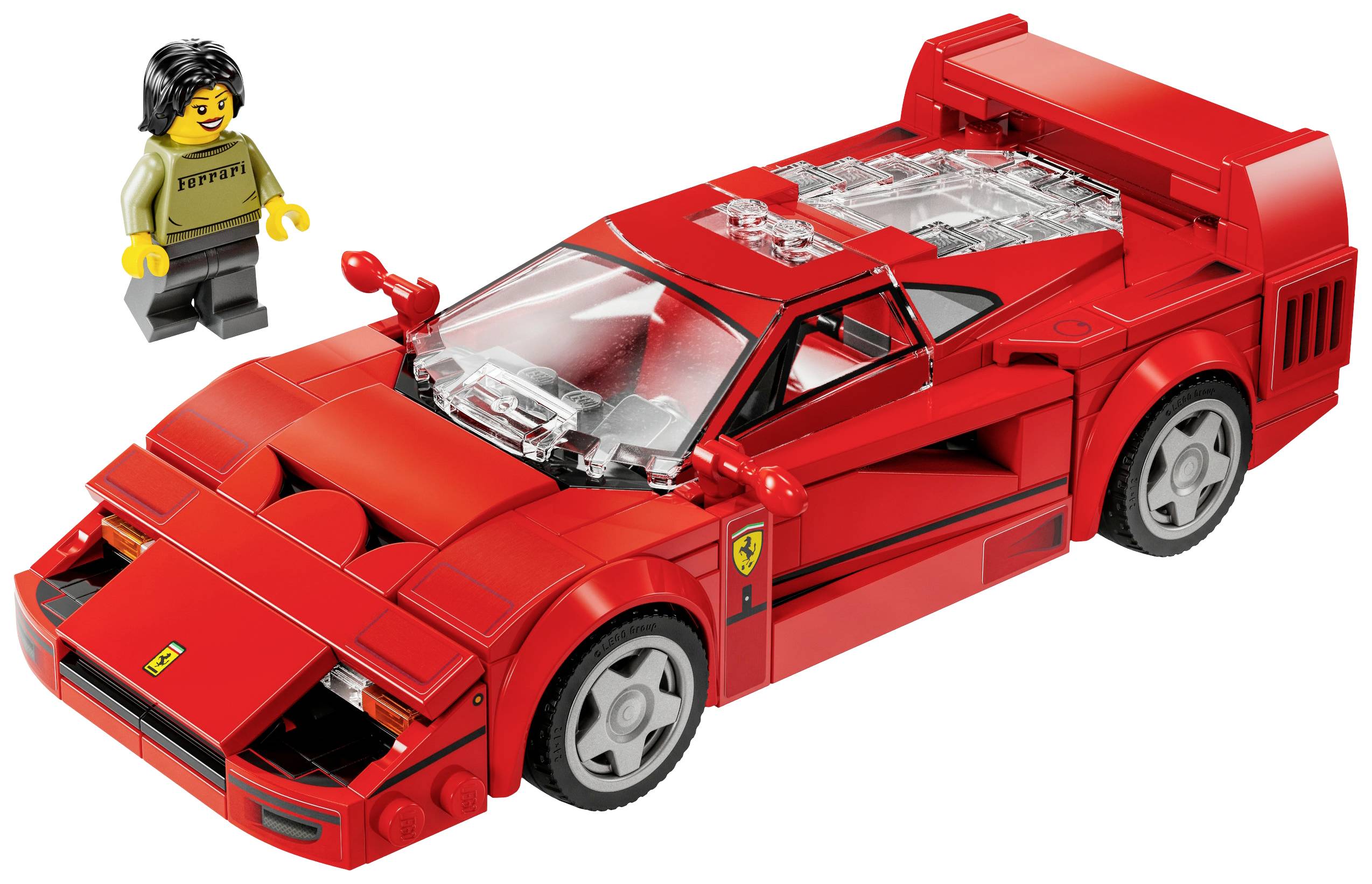 Une voiture de sport LEGO rouge et une figurine LEGO portant un haut sur lequel est inscrit 'Ferrari'.