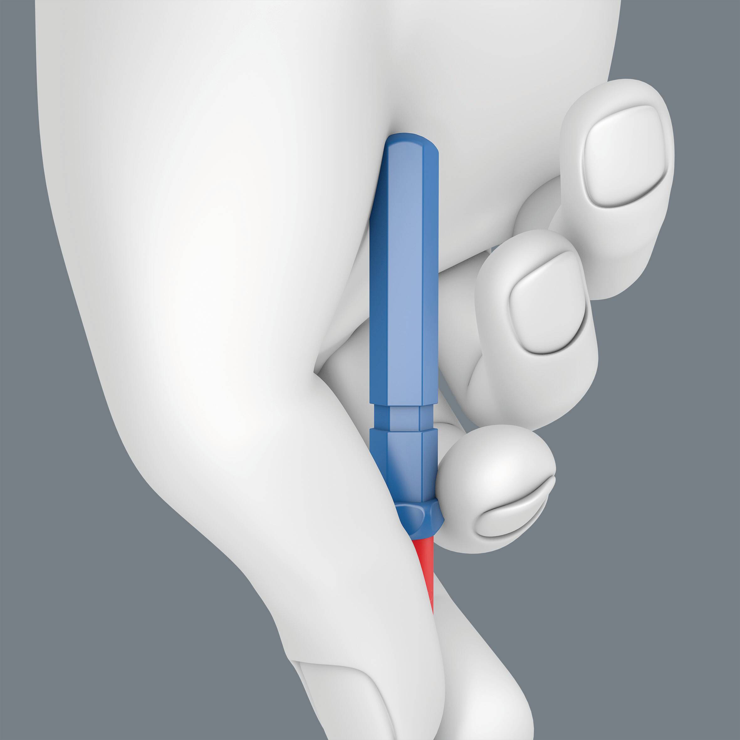 Une main tient un stylo bleu avec un embout rouge.