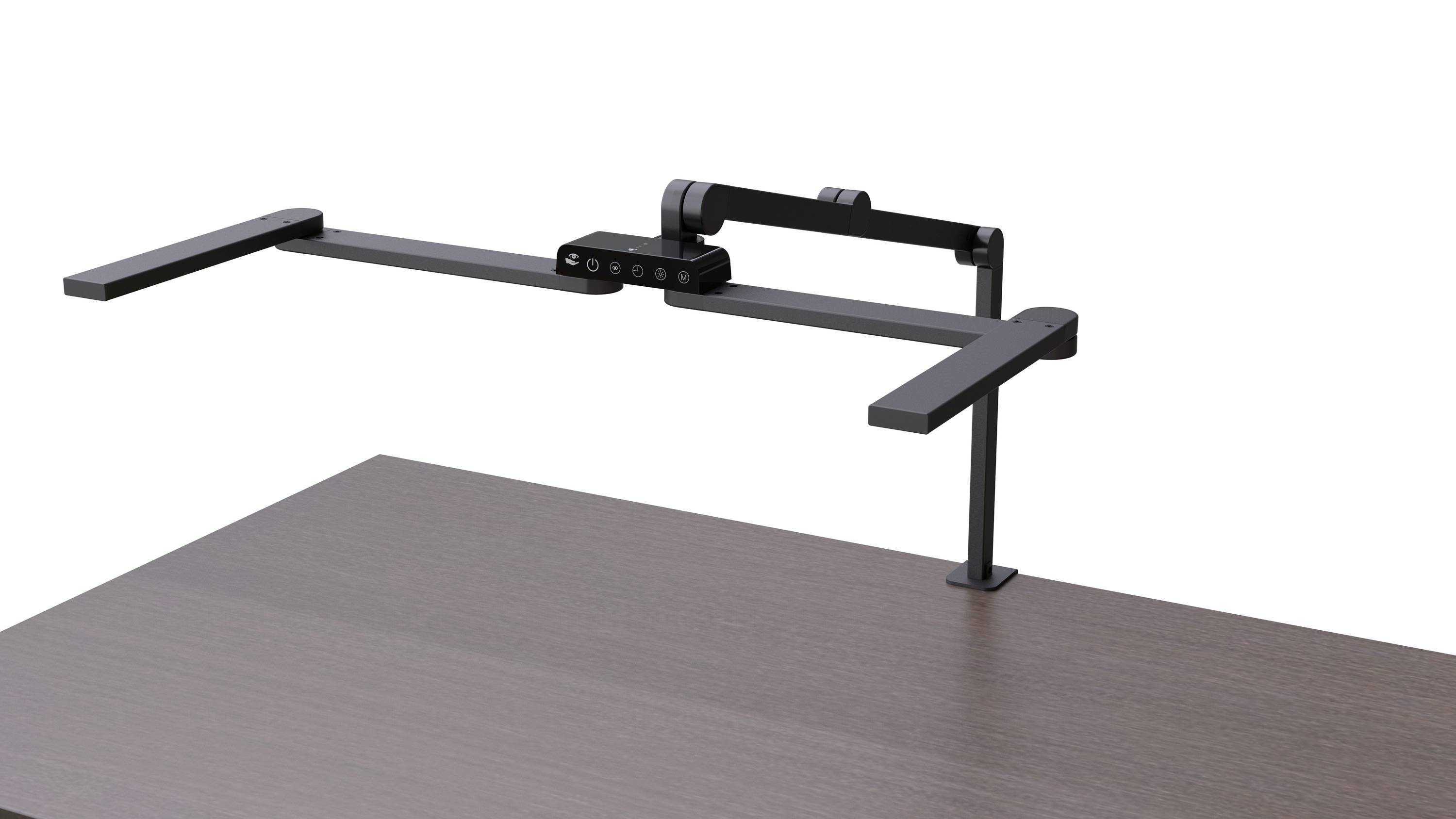 Un bras de moniteur gris foncé est fixé à l'arrière d'une table en bois. Le bras dispose d'une possibilité de réglage flexible.