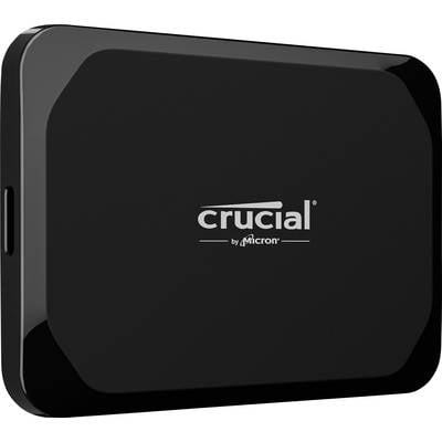 Disque dur externe noir portant l'inscription 'crucial by micron' au centre.