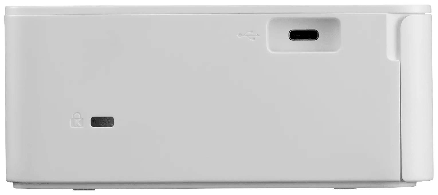 Appareil électronique blanc avec deux ports et un symbole sur la face avant.