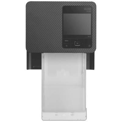 'Imprimante Schwarzer Selphy CP1500 avec écran et commandes à l'avant, sortie papier visible en bas. Design compact, équipée du Wi-Fi.'