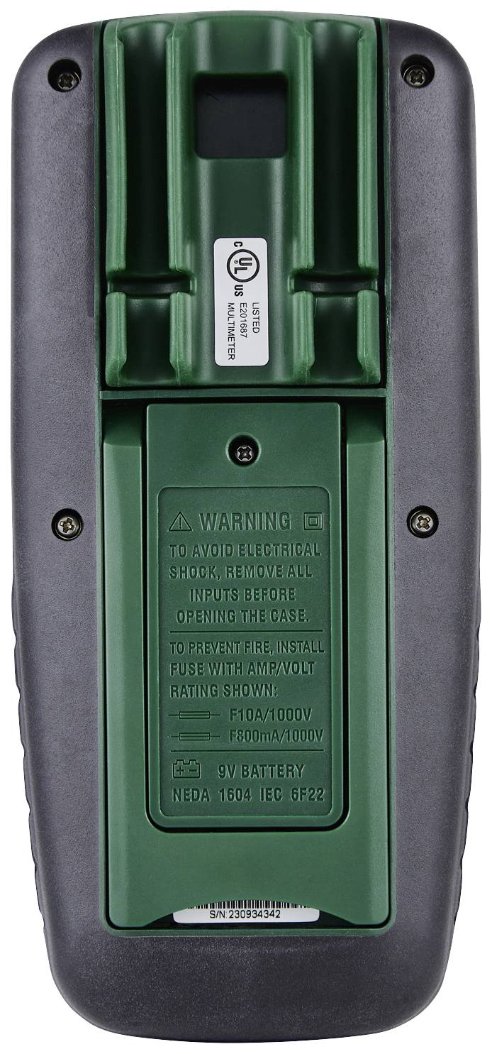 Vue arrière d'un appareil électronique vert avec un compartiment à batterie et des avertissements. Comprend des spécifications techniques relatives à la consommation électrique.