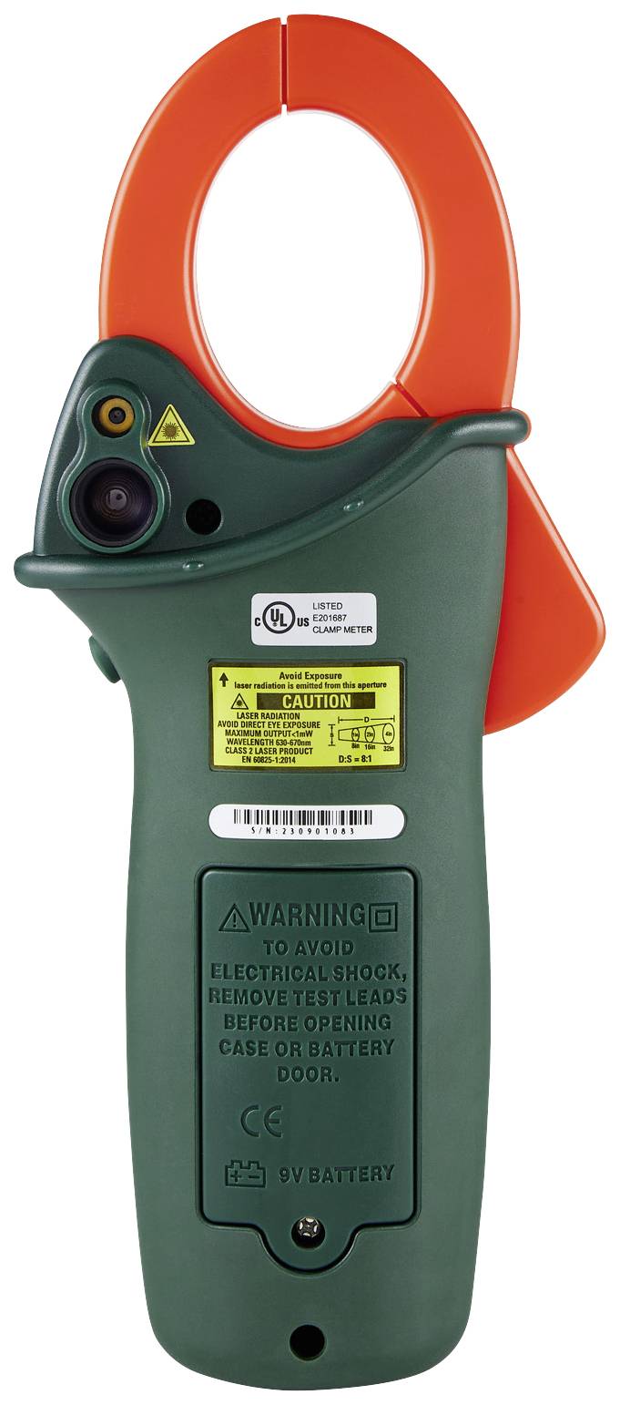 Un appareil de mesure électrique vert et orange avec une pince ouverte, des étiquettes d'avertissement de sécurité et des informations sur le produit au dos.