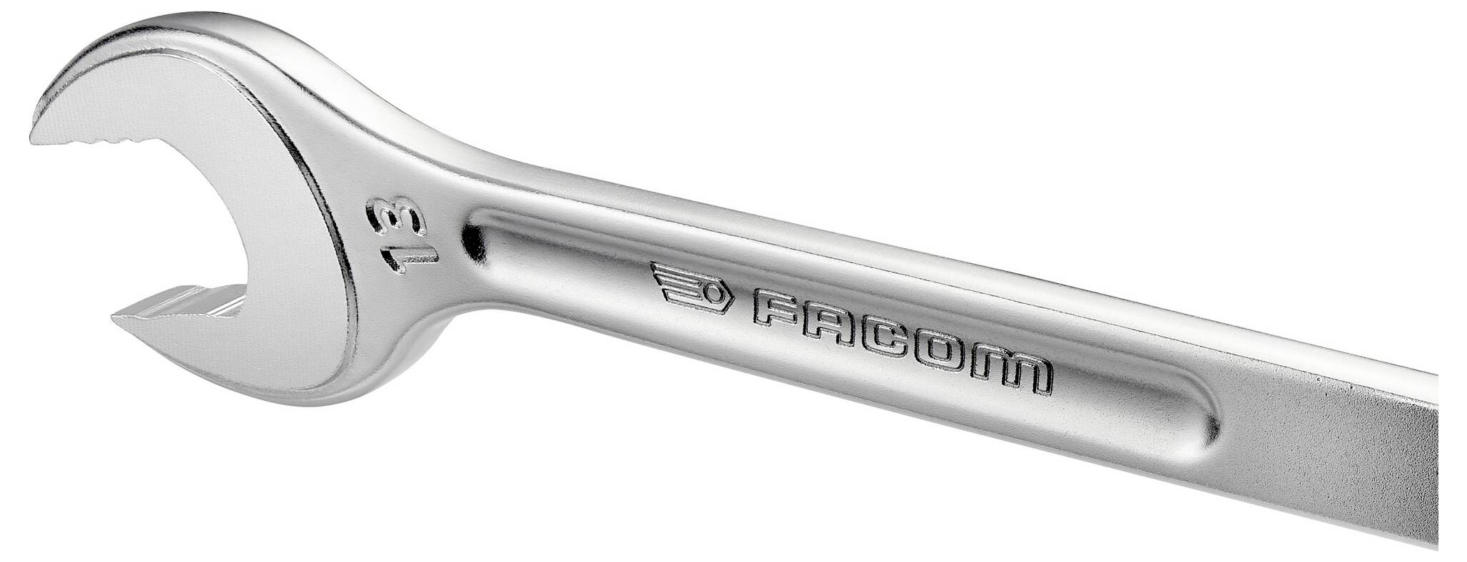 Une clé à molette en argent gravée de l'inscription 'FRANCE FACOM', adaptée pour serrer ou desserrer des écrous et des boulons.