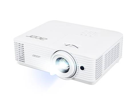 Un projecteur blanc posé sur une surface projette une lumière vive vers l'avant.