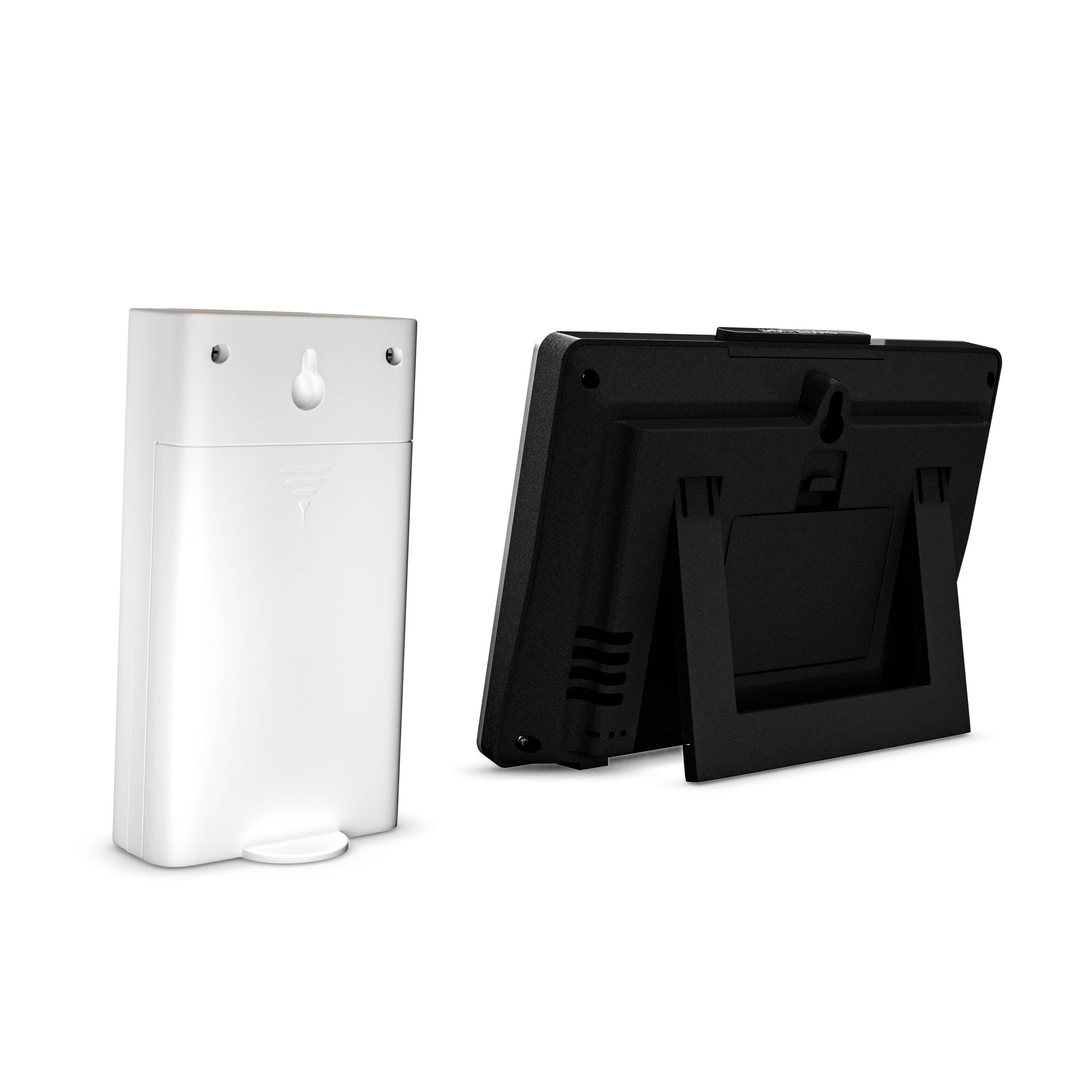 Un purificateur d'air blanc rectangulaire avec des trous en haut à gauche, à côté d'un support d'appareil noir rectangulaire avec un socle.