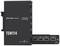 Switch réseau noir Schwarzer TSW114 avec cinq ports Ethernet, connexion d'alimentation et étiquette 'TELTONIKA NETWORKS'. Fabriqué en Lituanie.
