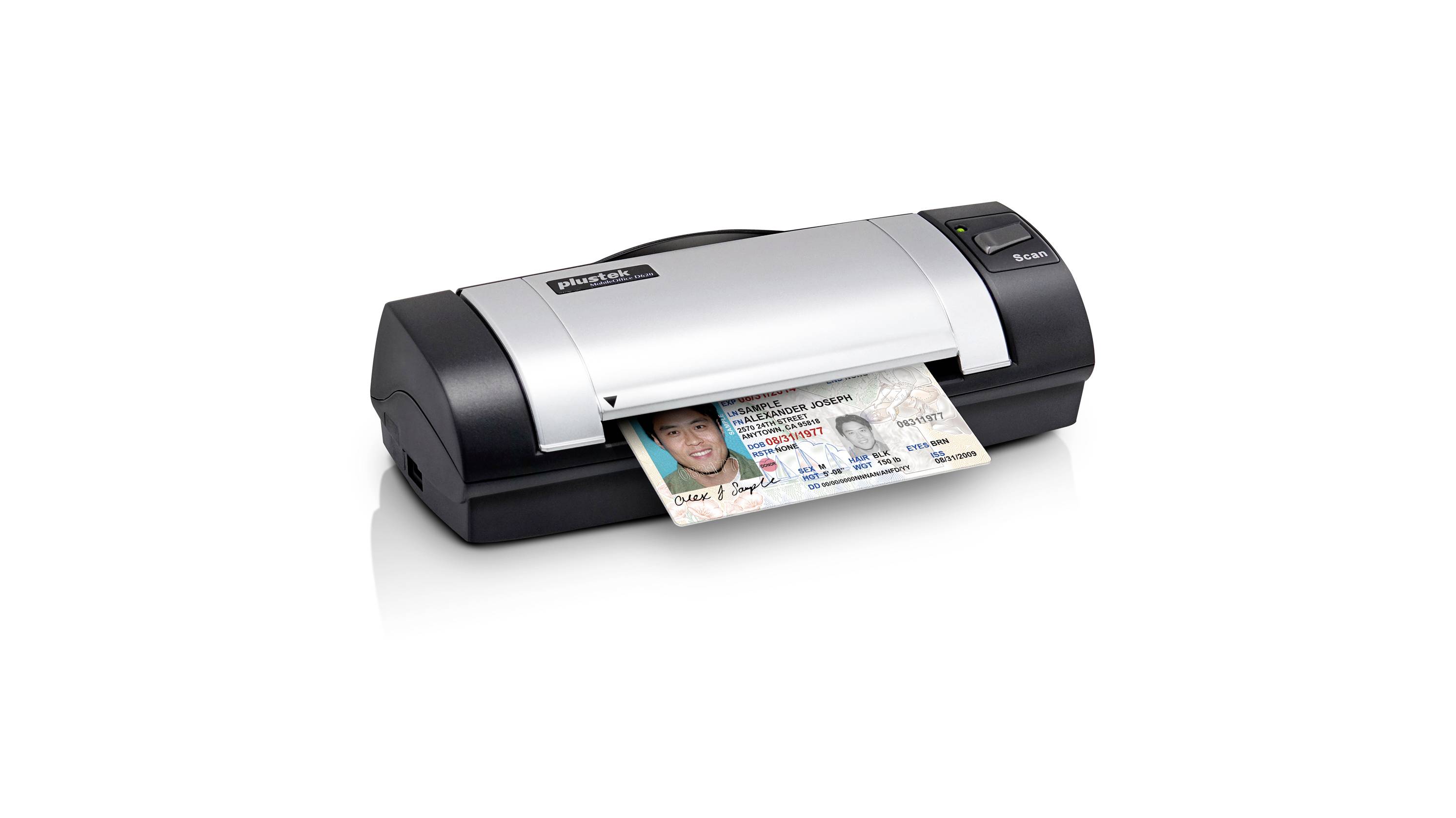 Un scanner de documents numérise une carte d'identité. La carte est introduite dans l'appareil depuis la gauche.