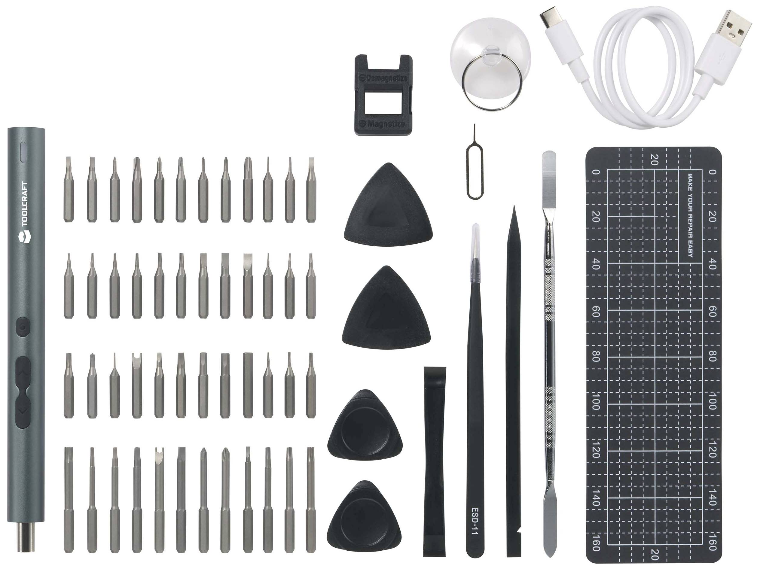 Un ensemble d'outils de précision comprenant des tournevis, des embouts, des pinces, des leviers et un rouleau de câble, disposés sur un tapis magnétique.