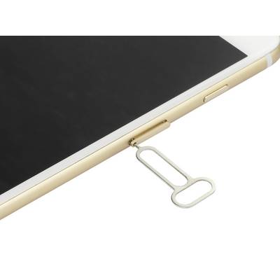 Un smartphone est posé à plat, avec un outil d'éjection de carte SIM inséré dans la fente pour retirer la carte SIM.