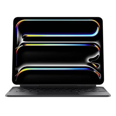 Un ordinateur portable avec un écran et un clavier modernes et colorés au premier plan. L'écran affiche des lignes courbes et colorées sur un fond noir.