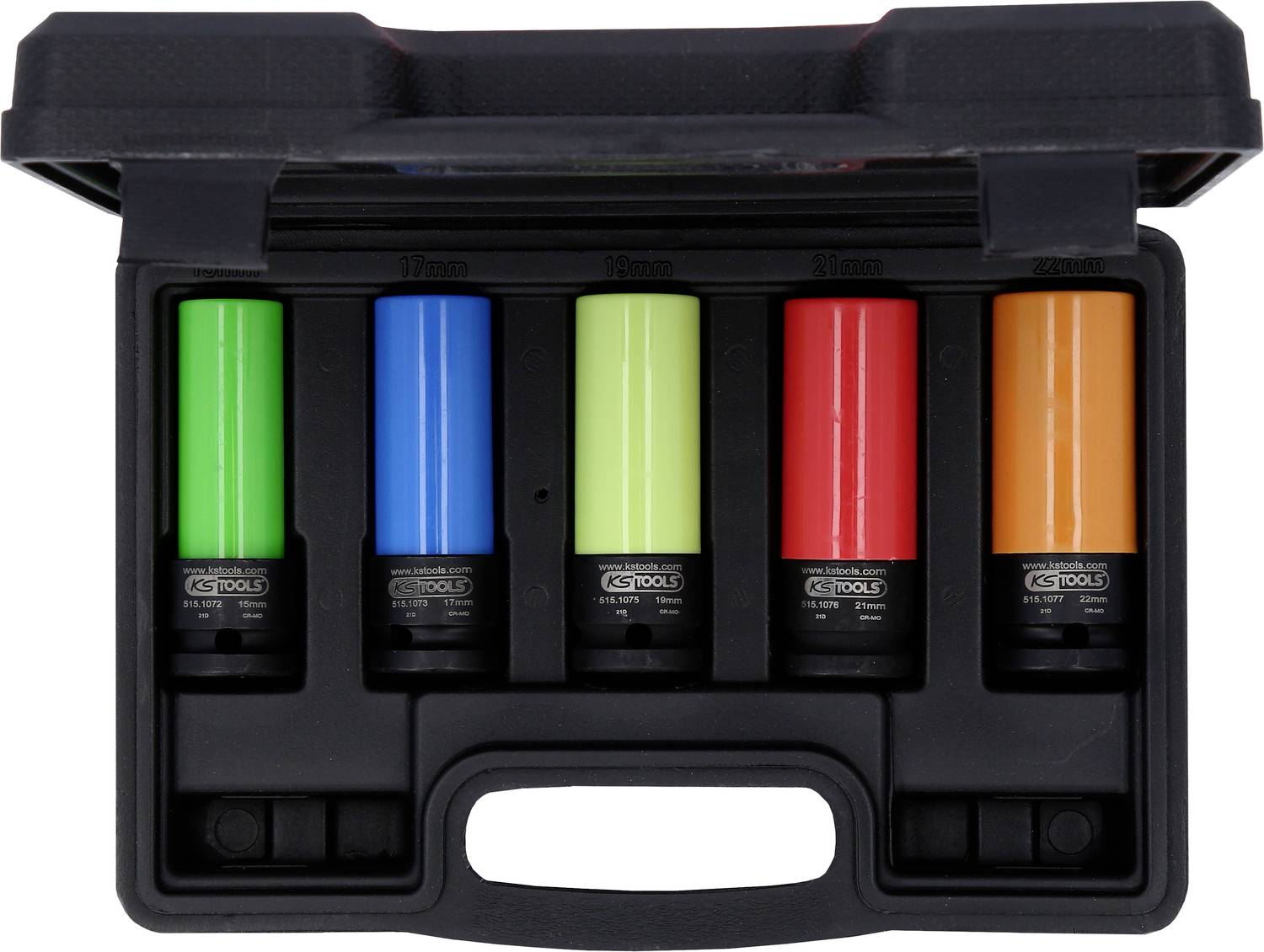 Une boîte noire contenant cinq punaises de couleurs - vert, bleu, vert clair, rouge et orange - disposées dans une valise.
