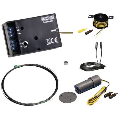 Kit électrique avec transformateur, câbles, bobine de fil, aimant et moteur. Composants pour la commande de modèles ferroviaires.