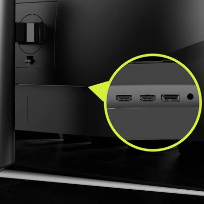 Gros plan d'un écran avec une loupe montrant trois ports HDMI à l'arrière, utiles pour les connexions.