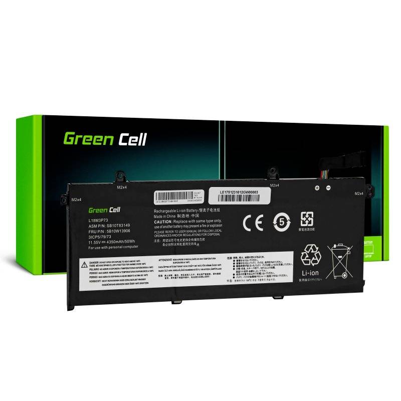 Un accumulateur noir pour ordinateur portable avec des spécifications techniques et des symboles de certification ; au second plan, on aperçoit l'emballage vert.
