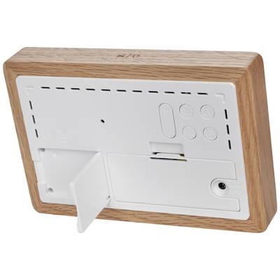 Un écran terminal à anneau avec un cadre en bois, montrant le côté arrière avec le compartiment de batterie, les éléments de commande et le pied de support.