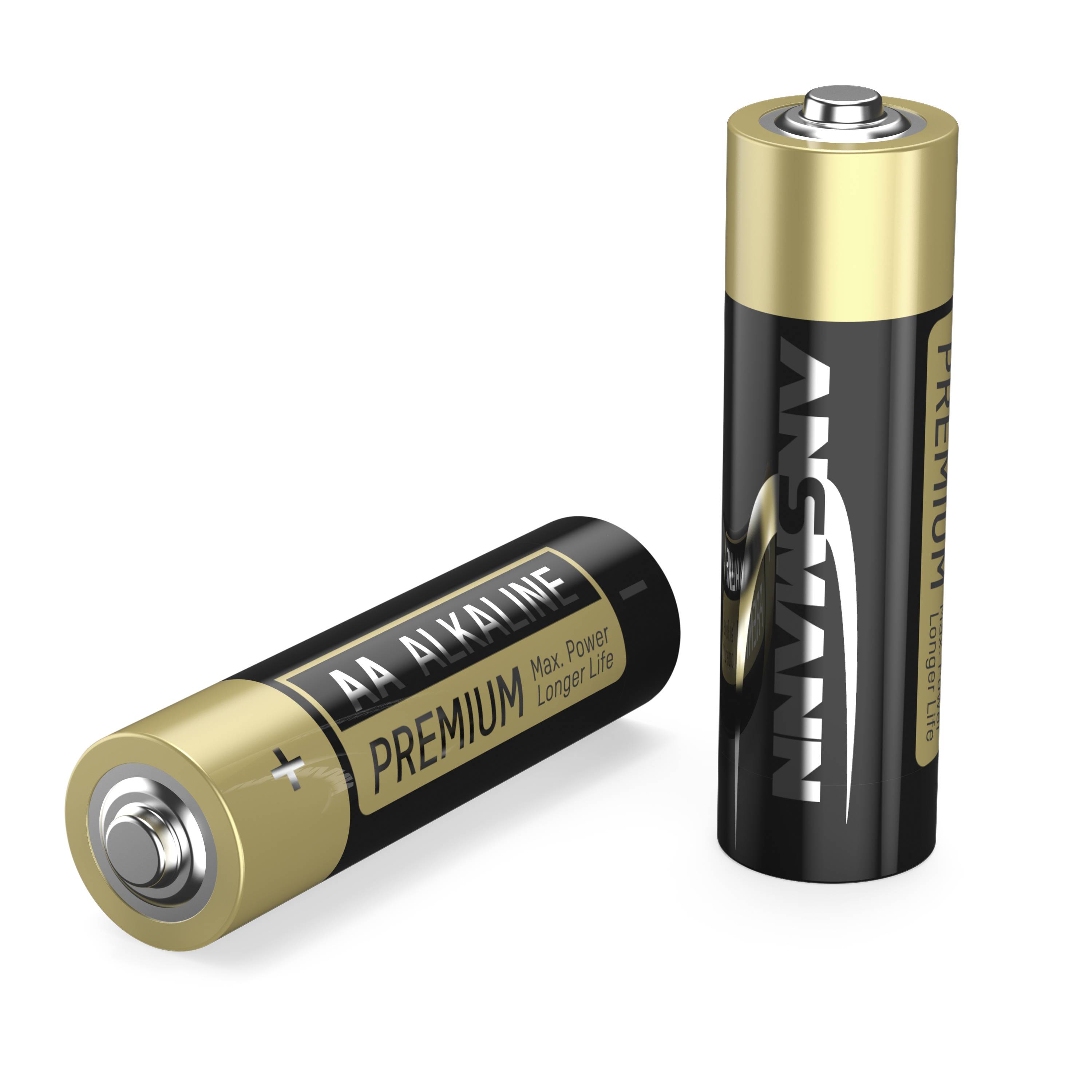 Deux piles alcalines AA noires avec des embouts dorés sur fond blanc, l'une couchée, l'autre debout, texte : 'PREMIUM'.
