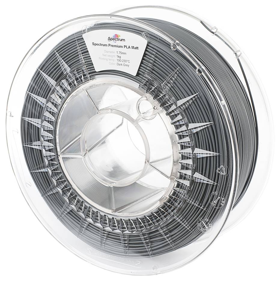 Un rouleau de filament PLA gris pour imprimante 3D. Sur la bobine, on peut voir une étiquette portant l'inscription 'Spectrum Premium PLA Mat, Gris Foncé'.