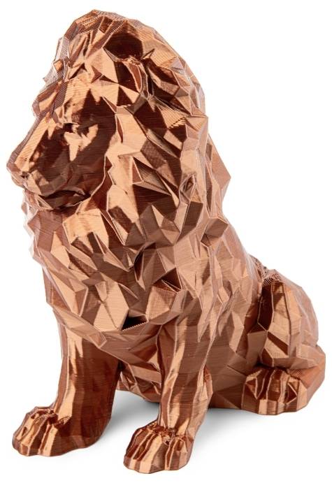 Une petite figurine de lion aux formes géométriques, réalisée dans un matériau brillant couleur cuivre.