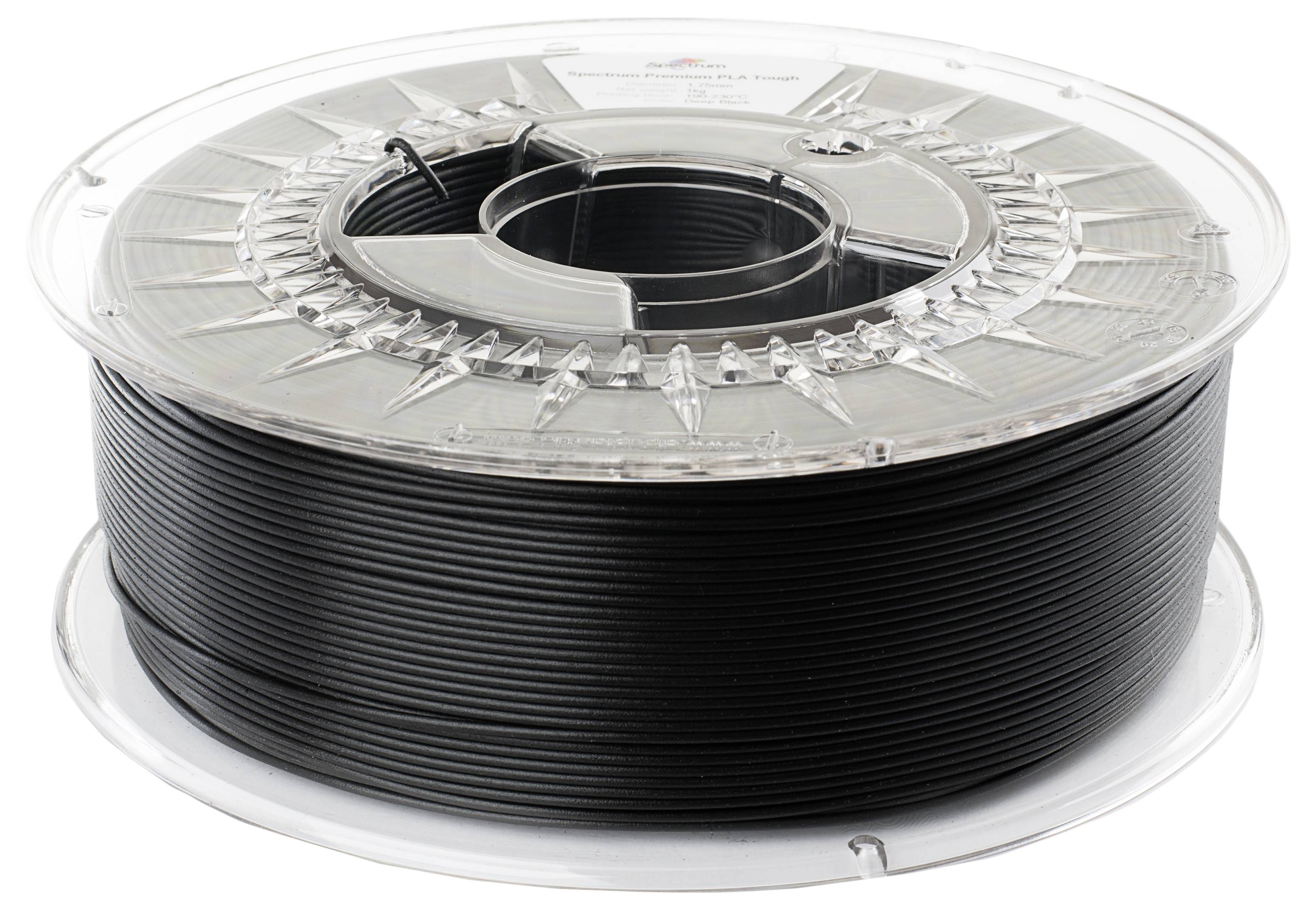 Une bobine de filament d'impression 3D noir, utilisé dans les imprimantes 3D pour fabriquer des objets.