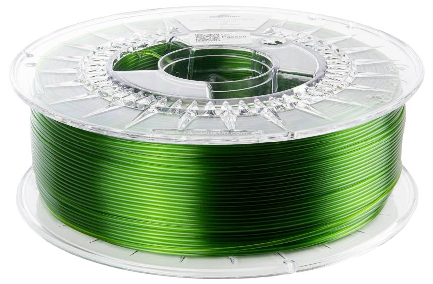 Un rouleau de filament pour imprimante 3D de couleur verte, dans un boîtier en plastique transparent.
