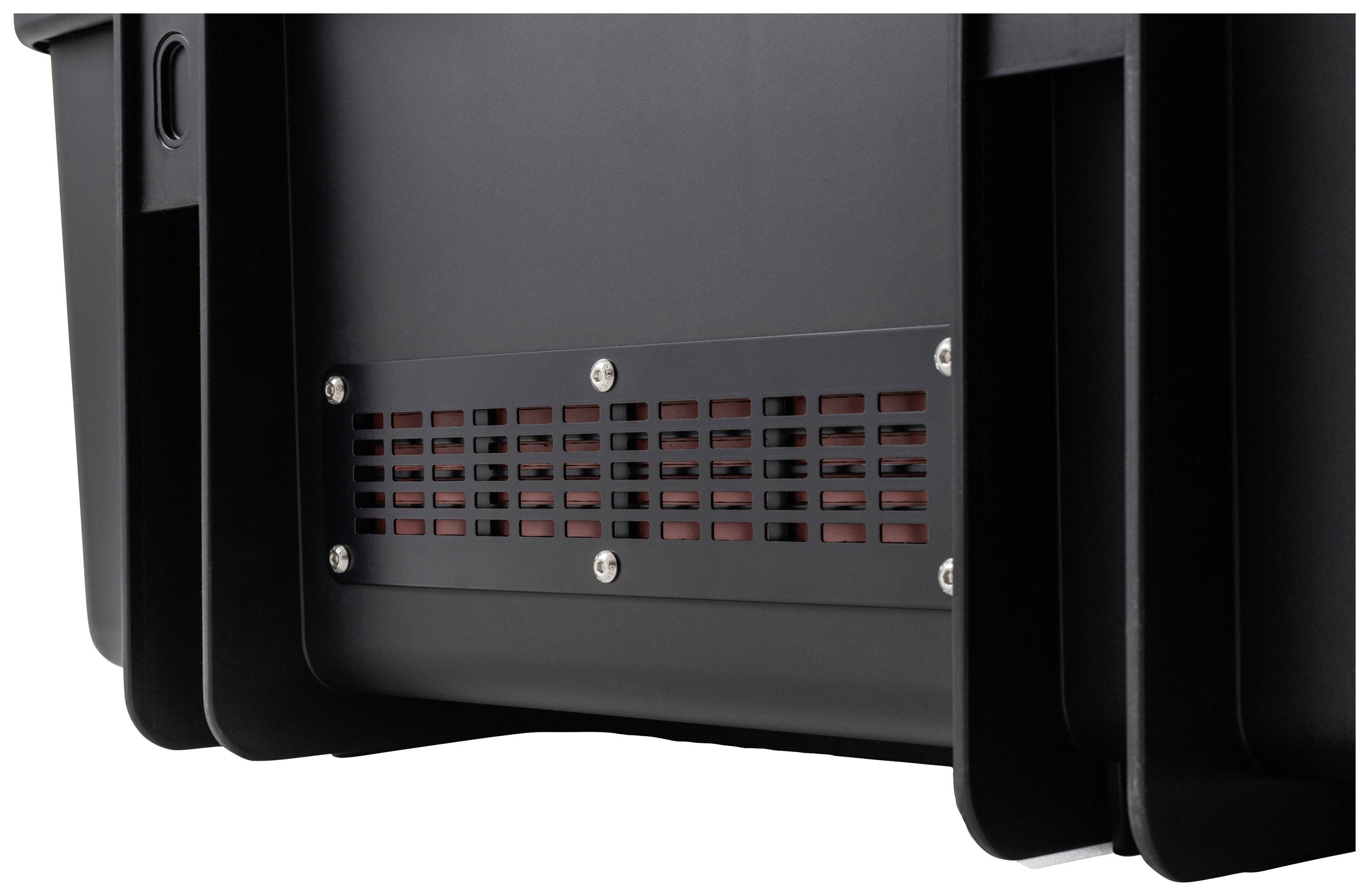 Boîtier en plastique noir avec grille de ventilation et vis apparentes sur le bord inférieur, probablement un composant d'un appareil technique.