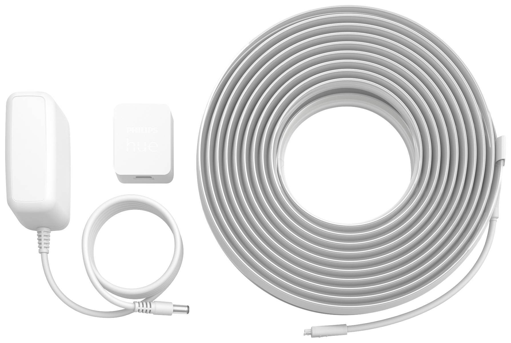 Bloc d'alimentation, adaptateur et ruban lumineux enroulé, probablement une extension Philips Hue, sur fond blanc.