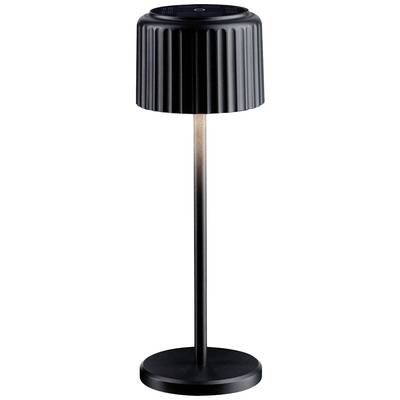 Une lampe de table élégante, noire, avec un abat-jour côtelé, éclairant vers le bas. Idéale pour les environnements de décoration intérieure modernes.