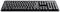 Un clavier d'ordinateur noir avec un pavé numérique à droite, des touches rétroéclairées et un design fin.