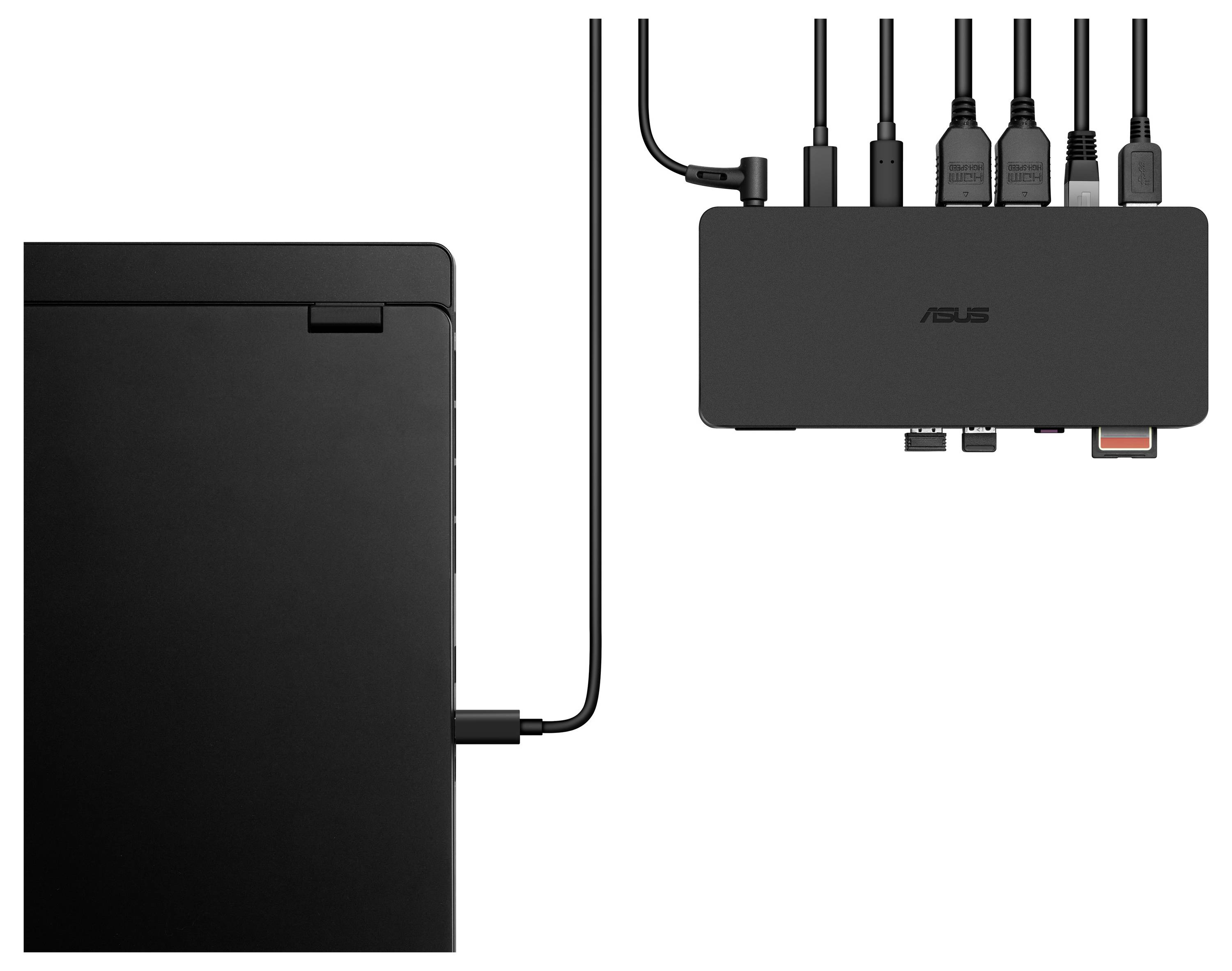 Un ordinateur portable noir est connecté par un câble à une station d'accueil à laquelle plusieurs appareils sont branchés.