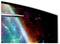 Un vaisseau spatial vole à travers l'espace, entouré de nébuleuses colorées et d'étoiles.
