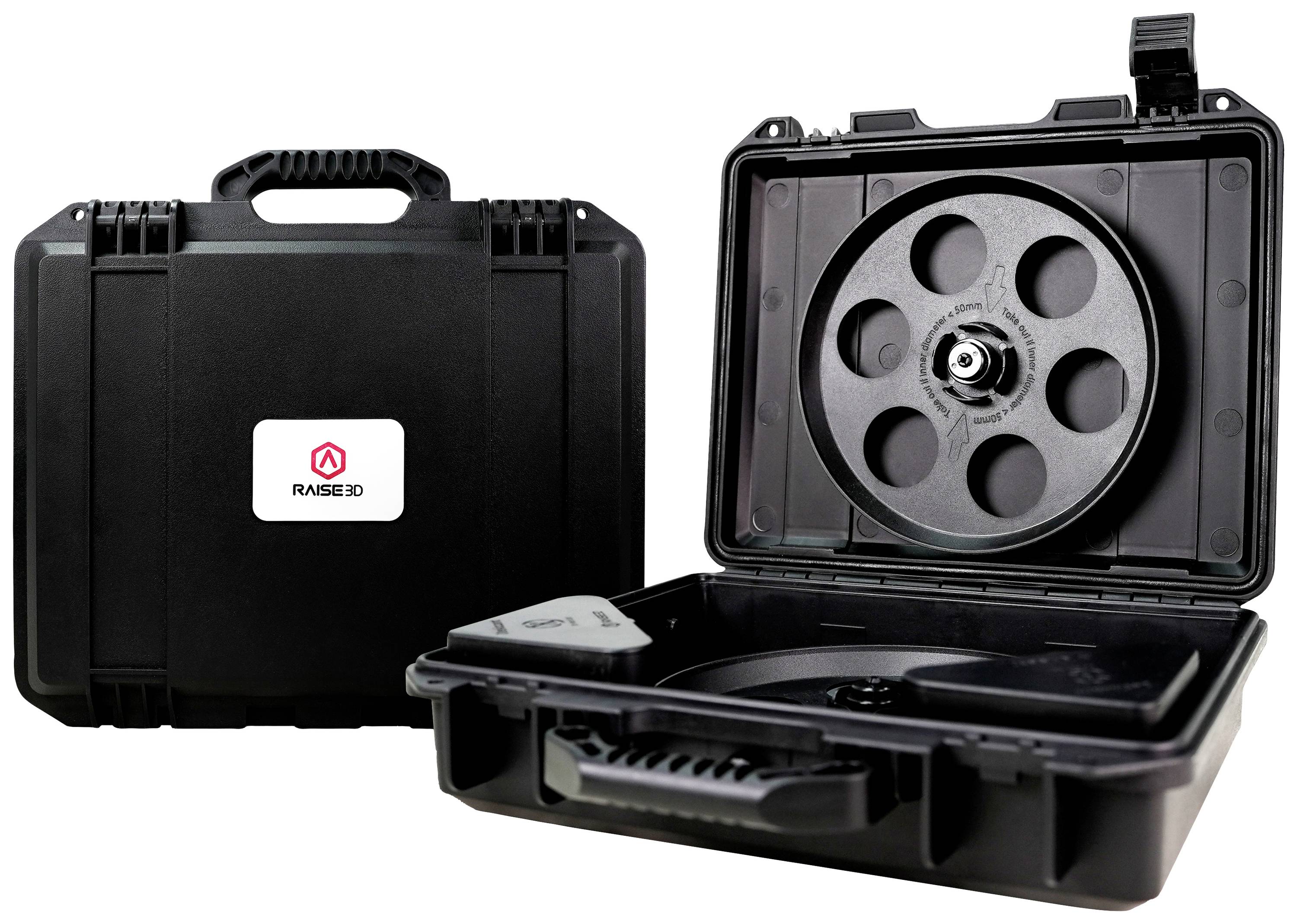 Valise rigide noire ouverte montrant trois rouleaux de matériau plat avec axe central. À côté, une valise fermée.