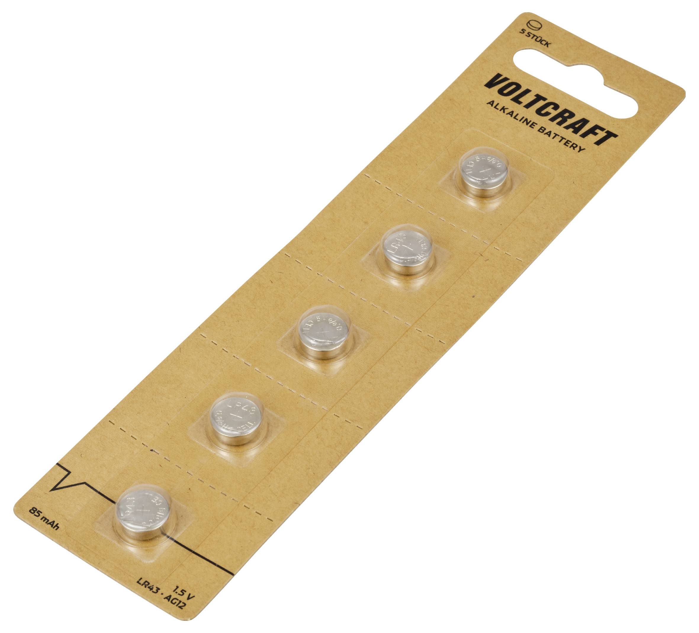 Emballage contenant cinq piles bouton de la marque 'Voltcraft', sur une carte blister rectangulaire en carton.