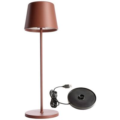 Lampe de table rouge avec un socle étroit et un abat-jour amovible, comprenant un câble de chargement USB et une base ronde.